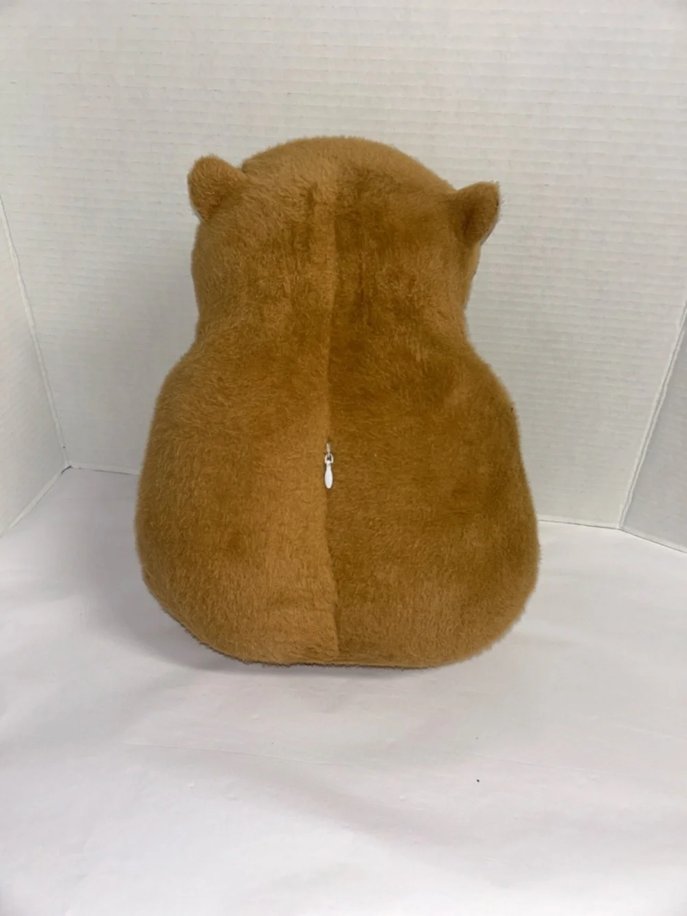 Plush Brown Capybara Pet Toy with Orange-and-White Donut Collar